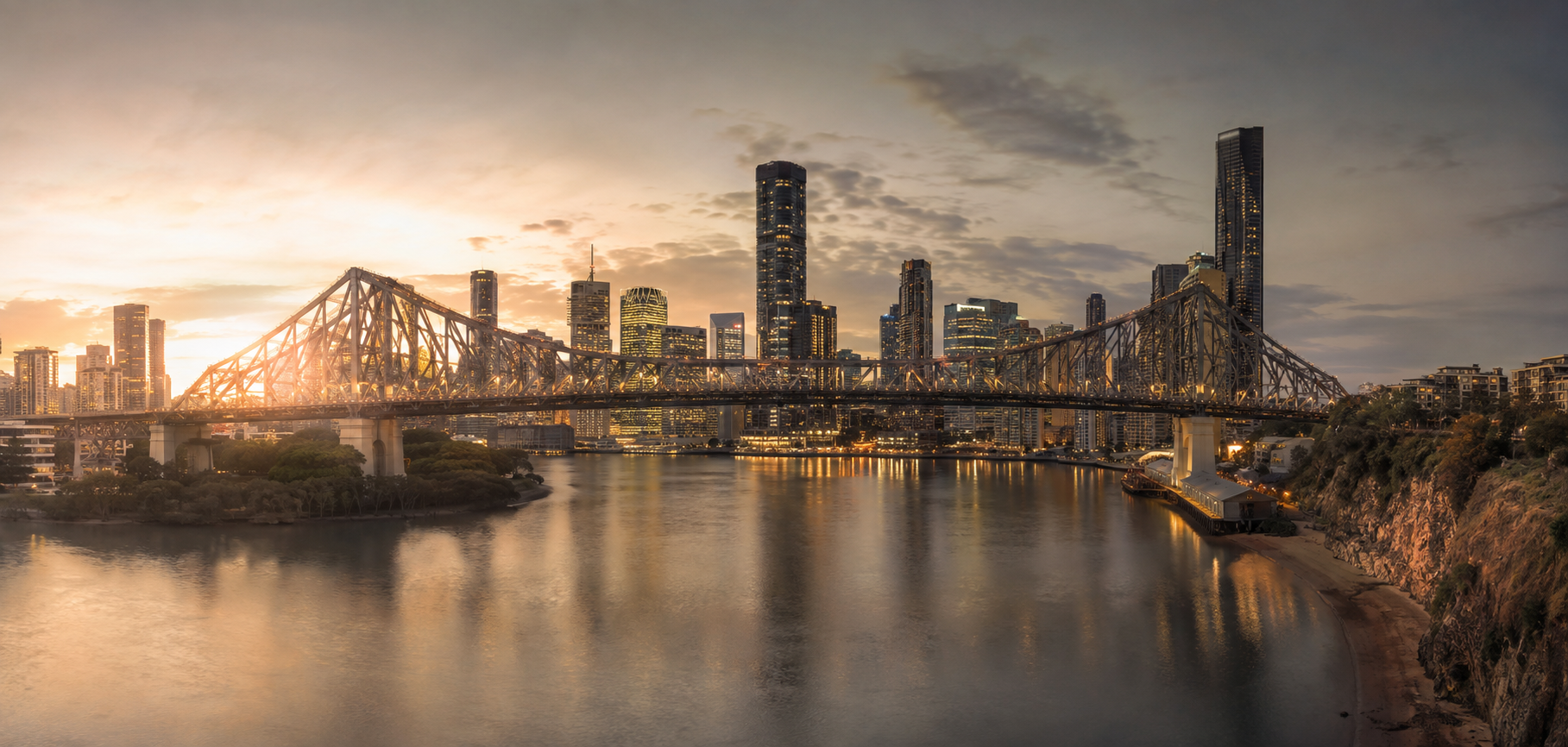 Brisbane skyline at sunset with the Story Bridge and Brisbane River